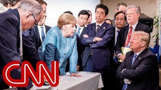 Merkel speaks out about viral Trump photo [upl. by Darrej380]